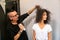 BTS of Celebrity hairstylist Reto Camichel in a salon with a female model