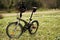 Btwin brand tilt 900 Foldable bicycle in meadow