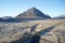 Buachaille Etive Mor in winter frost barren empty moor landscape and road bridge popular for Scottish tourism Scotland uk