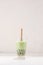 Bubble green Tea glasses with drink straw on white background