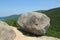 Bubble Rock on top of the South Bubble Mountain and Jordan Pond at Acadia National Park