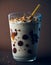 Bubble tea and milk with bright splashes. The drinking water is chocolate and added with a sprinkle of cocoa powder.