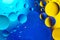 Bubbles of oxygen in water. Water structure. Blue and yellow abstract water bubbles texture background