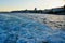 Bubbling blue waves of traces of tourist cruise ships passing on the Bosporus. Water trail foaming behind a passenger