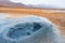 Bubbling geothermal hot/mud pool in the Hverarond area near Myvatn in the Icelandic landscape.