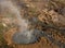 A bubbling geothermal spring near Reykjadalur