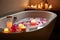 bubbly bath with floating candles and essential oils