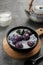 Bubur candil or Candil porridge is porridge made from purple sweet potato cooked with coconut milk, sugar and pandan leaves.