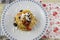 Bucatini pasta with peppers, capers, olives and cherry tomatoes