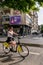 Bucharest/Romania - 05.16.2020: Girl riding a yellow bicycle, People enjoying a nice dayin the center of Bucharest after the