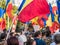Bucharest/Romania - 09.19.2020: Many people with Romanian flags in their hand protesting against wearing face masks in schools