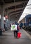 Bucharest/Romania - 11.16.2020: Old woman with big heavy bags on the train platform North railway station Garade Nord