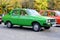 Bucharest, Romania, 24 October 2021: Old vivid green Romanian Dacia 1310 TX classic car produced in year 1987 parked in a street