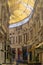 BUCHAREST, ROMANIA - 27 JULY, 2019: Macca Villacrosse Passage - a fork-shaped, yellow glass covered arcaded street in central