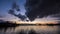 Bucharest sunset with dramatic clouds over Herastrau park