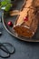 Buche de Noel. Traditional Christmas dessert, Christmas yule log cake with chocolate cream, cranberry. Copy space