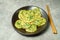 buchujeon, korean Chive Pancake, To prepare this dish, chive, julienned carrot, and green pepper are mixed with flour and pan-