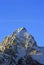 Buck Mountain at sunset with cirrus clouds overhead in the Grand Teton Mountain Range in Grand Tetons National Park in Wyoming