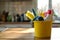 Bucket with cleaning items on wooden table