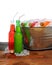 Bucket of Cold Sodas on Wooden Table