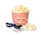 Bucket of fresh popcorn, tickets and 3D glasses on background. Cinema snack