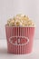 Bucket of popcorn on white background