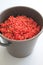 A bucket of red currants waiting to be preserved