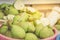 bucket of ripe pears in a garden/pailful of the ripe cut pearsm, selective focus