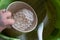 Bucket of rock salt is ready to pour on your ice and snow