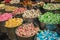 Buckets filled with taffy candy at a candy shop. A variety of candy in a store