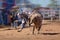 Bucking Bull Riding At A Country Rodeo