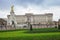 Buckingam Palace yard with green grass in front. London city