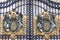 Buckingham Palace, decorative entrance gate with Royal coat of arms, London, United Kingdom