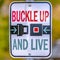 Buckle Up And Live road sign for safe driving