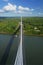 Bucksport, Maine, USA: White clouds in a bright blue sky over the Penobscot Narrows Bridge