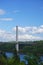 Bucksport, Maine, USA: White clouds in a bright blue sky over the Penobscot Narrows Bridge