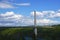 Bucksport, Maine, USA: White clouds in a bright blue sky over the Penobscot Narrows Bridge