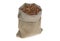 Buckwheat in linen bag on white