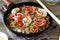 Buckwheat noodles with shrimp, peppers and tomatoes