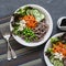 Buckwheat noodles with vegetables. Vegetarian soba and vegetable buddha bowl. On a gray background