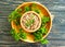 Buckwheat porridge, cereal prepared rustic parsley on a wooden background vegan