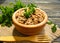 Buckwheat porridge, cereal  rustic  parsley on a wooden background vegan