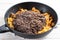 Buckwheat soba noodles in a frying pan. Preparation Japanese dish buckwheat noodles with vegetables and meat. Step by step