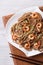 Buckwheat soba noodles with shrimp close-up. vertical top view