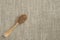 Buckwheat with a wooden spoon in the background / texture