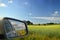 Bucolic Countryside Denmark reflected in car wing mirror