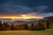 Bucovina autumn sunrise landscape in Romania with mist and mountains