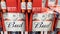 Bud logo sign and brand text on pack of stacked beer bottles for sale in store pallet