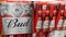 Bud logo sign and text brand of American Budweiser beers pack of stacked beer bottles