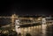 Budapest Chain Bridge and Parliament at night, with Budapest beautiful night lights and the river Duna in a special look.